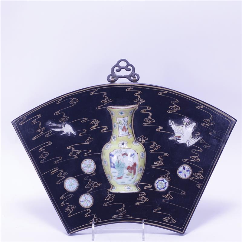 Appraisal: Chinese fan shaped lacquer plaque with Famille Rose porcelain pocket