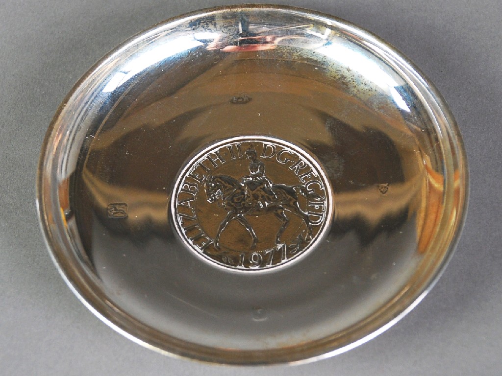 Appraisal: PLAIN SILVER SMALL DISH ASHTRAY the base inset with CROWN