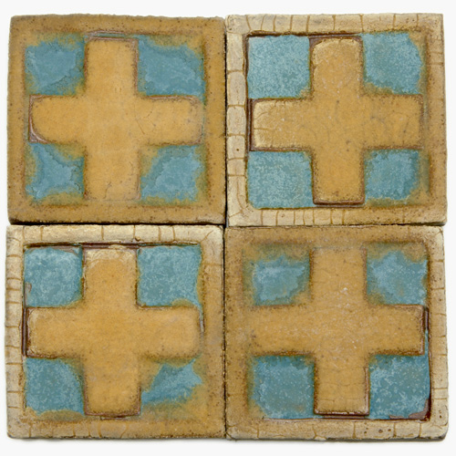 Appraisal: GRUEBY Forty-four tiles with a raised cross and border pattern