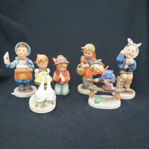 Appraisal: Hummel Figurines stylized bee -line mark to excellent