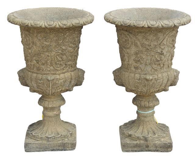 Appraisal: pair Cast stone campana-form garden urns th c egg-and-dart rim