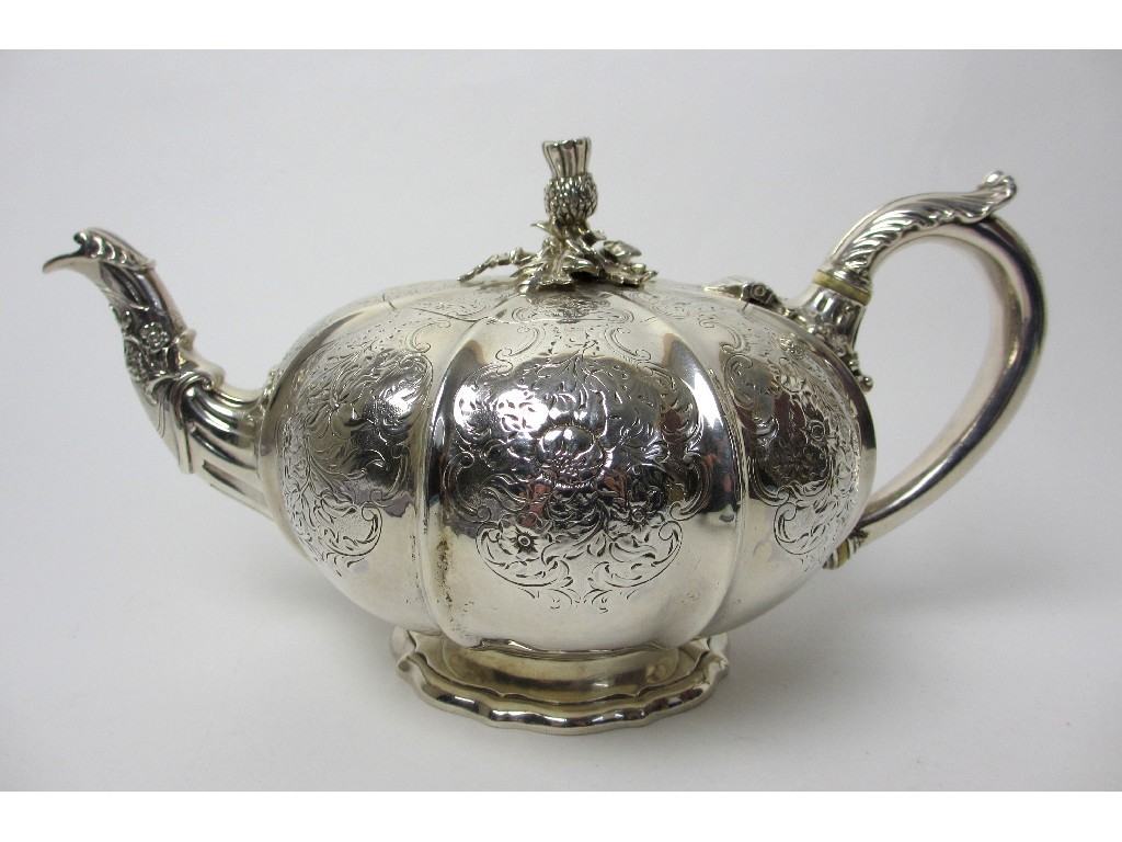 Appraisal: A William IV silver teapot of lobed melon shape on