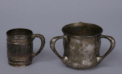 Appraisal: TIFFANY CO REPOUSS SILVER MUG AND THEODORE B STARR THREE-HANDLED