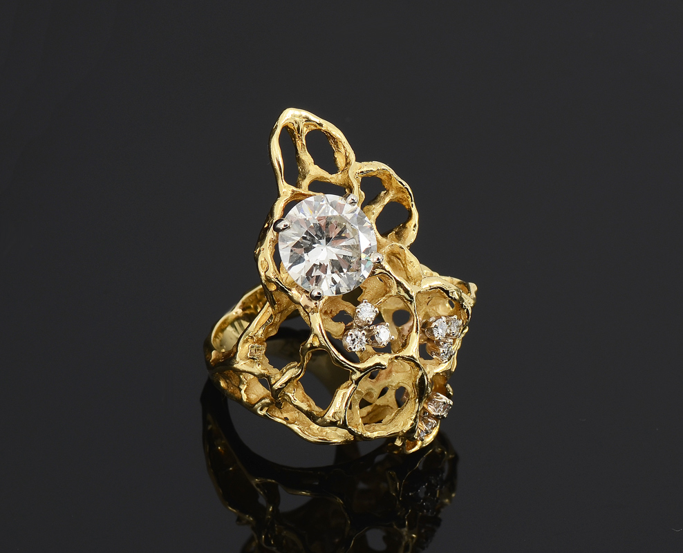 Appraisal: CT DIAMOND SOLITAIRE RING K yellow gold freeform open multi