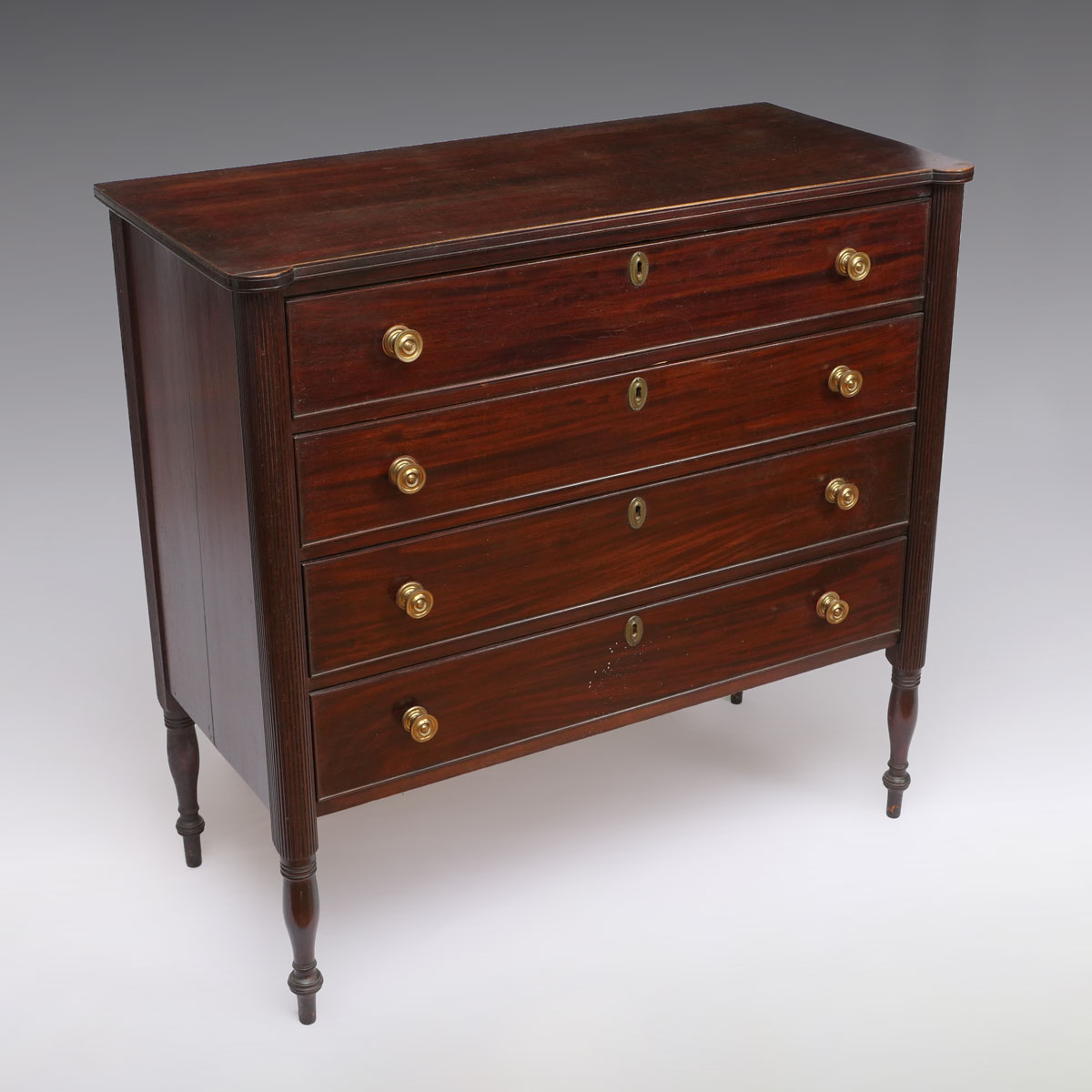 Appraisal: SHERATON DRAWER CHEST - Drawer Sheraton chest having brass medallion