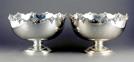 Appraisal: Pair silverplate punchbowls pierced and scalloped basin on circular stepped