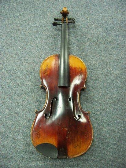 Appraisal: A single back violin the front decorated leaves the back