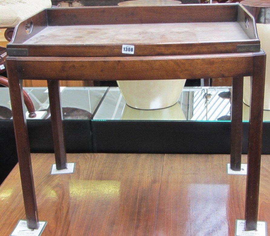 Appraisal: An th century style mahogany butlers tray on stand cm