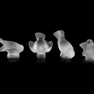 Appraisal: Four Lalique Bird Ornaments Second Half th Century Height of