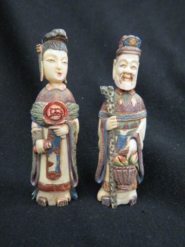 Appraisal: Pair of Carved Ivory Snuff Bottles Emperor Empress fancy coloring