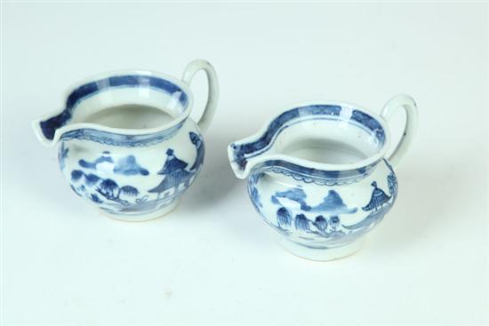 Appraisal: TWO CANTON CREAMERS China th century Two similar bullnose creamers