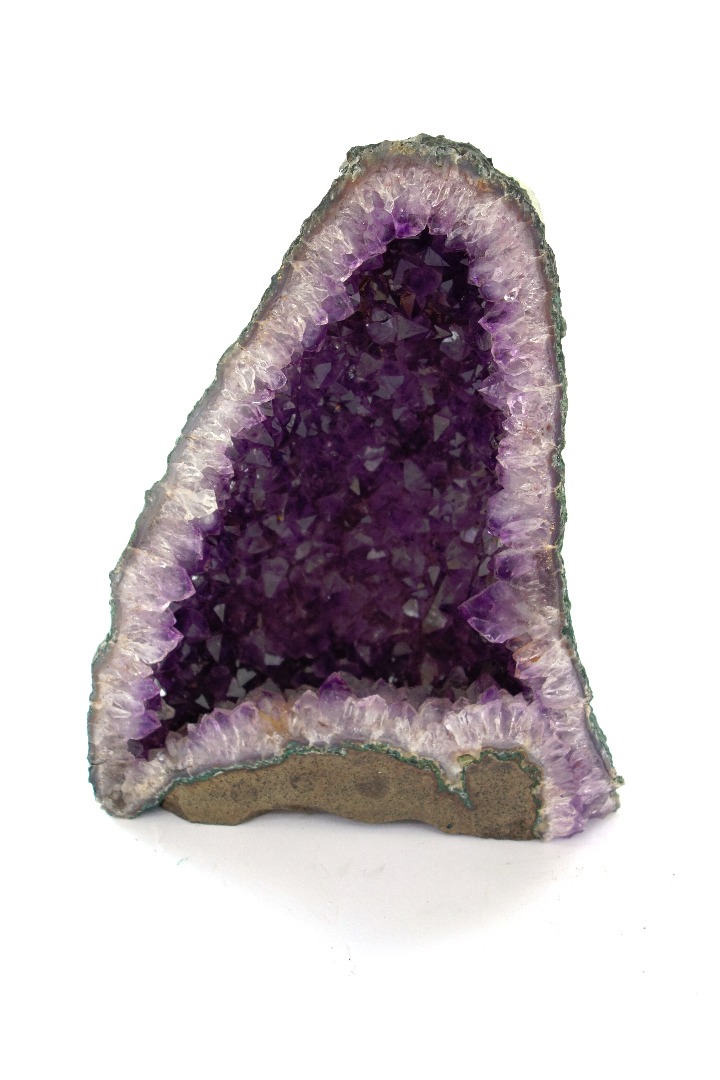 Appraisal: An amethyst quartz specimen sample cm high a polished ammonite