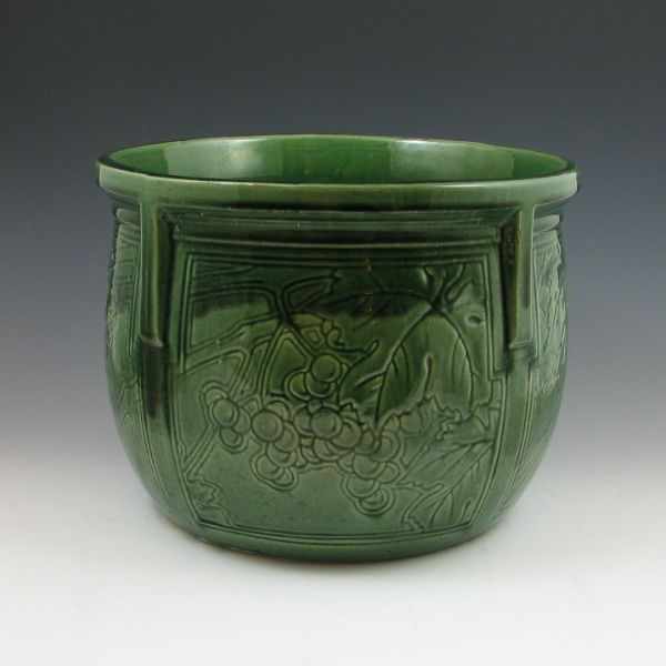 Appraisal: Weller green majolica jardiniere with grapevine decoration Marked WELLER in