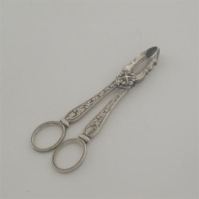 Appraisal: A pair of George III IV ice tongs with ring