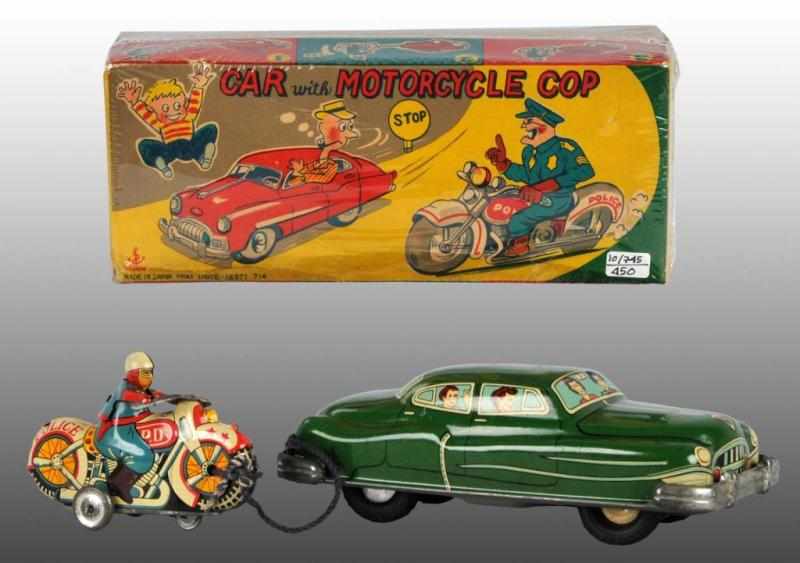 Appraisal: Tin Car with Motorcycle Friction Toy Description Japanese Working Automobile