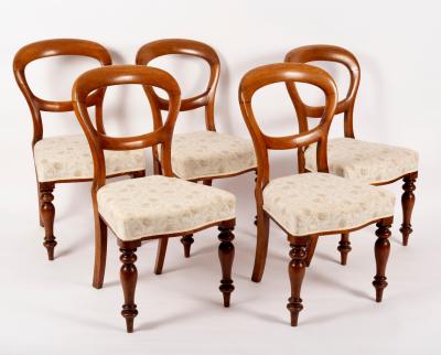 Appraisal: Five Victorian walnut dining chairs with upholstered seats on turned