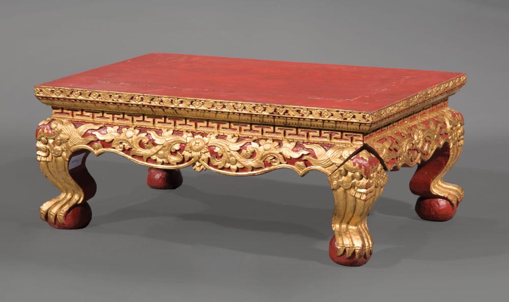 Appraisal: Asian Gilt and Lacquered Low Table floral and foliate molded