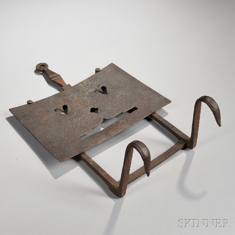 Appraisal: Wrought Iron Fender Trivet England late th early th century