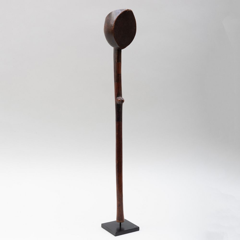 Appraisal: South African Carved Hardwood Staff Zulu Raised on stand in