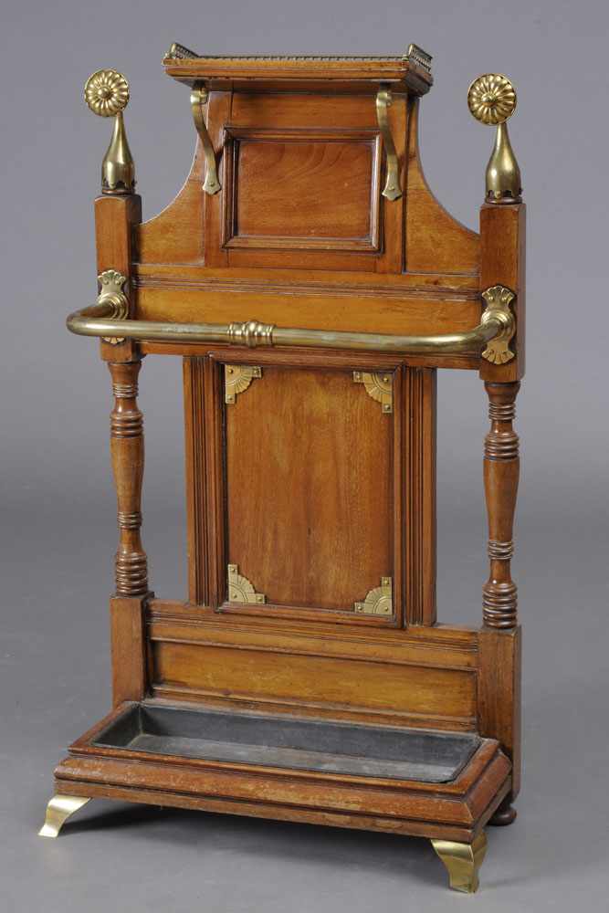 Appraisal: AESTHETIC MOVEMENT BRASS-MOUNTED MAHOGANY UMBRELLA STAND The three-quarter galleried top