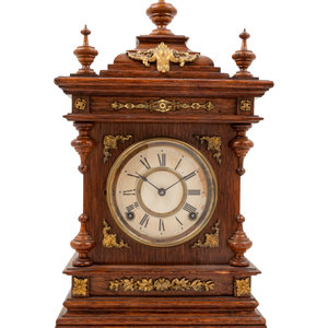 Appraisal: An Ansonia Cabinet A Brass Mounted Oak Shelf Clock Height