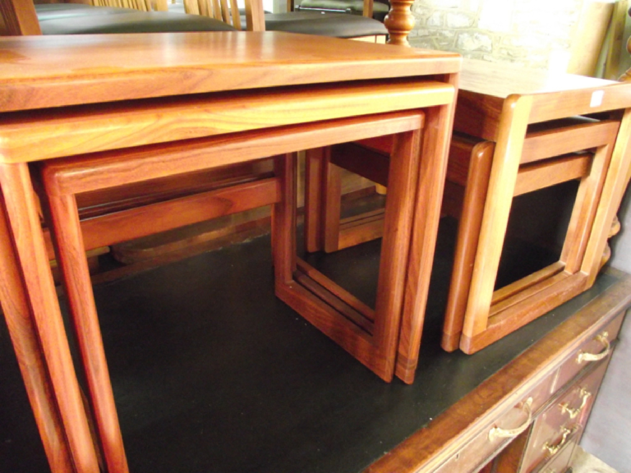 Appraisal: Two nests of three graduated teakwood occasional tables