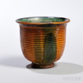 Appraisal: Glazed Earthenware Cup Glazed Earthenware Cup China Tang dynasty the