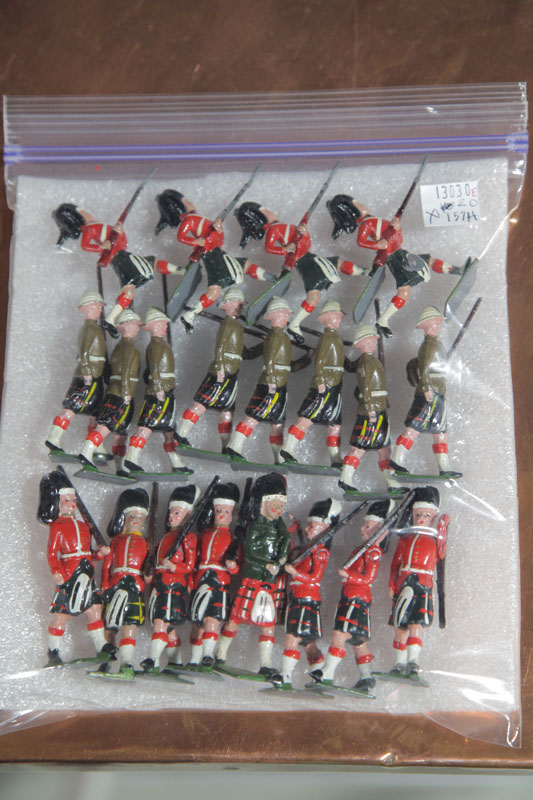 Appraisal: TWENTY BRITAINS MILITARY FIGURES SCOTTISH HIGHLANDERS Six with red plaid