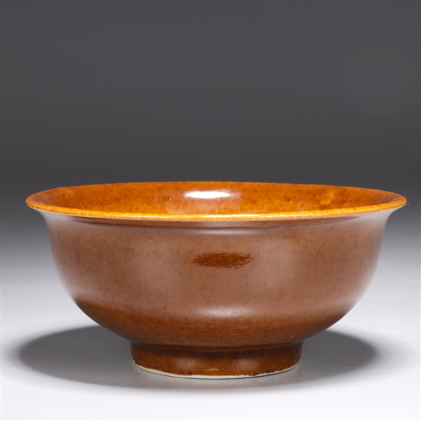 Appraisal: Unusual Chinese brown glazed porcelain bowl with six character mark