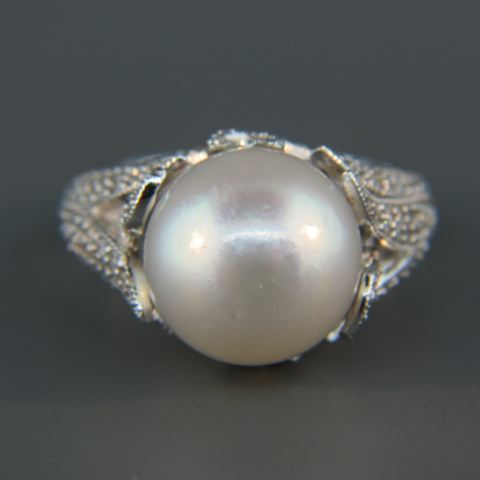 Appraisal: South Sea Pearl Diamond Ring mm pearl and round diamonds