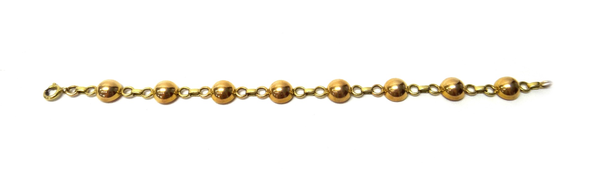 Appraisal: A gold bracelet in a hemispherical circular and oval link