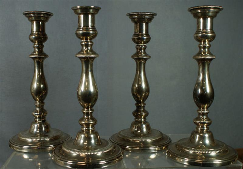 Appraisal: George III silver candlesticks Sheffield - weighted bases possibly J