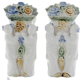 Appraisal: Pair Chinese Porcelain Figural Wall Pockets th century modeled in