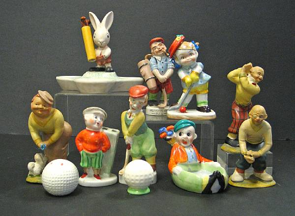 Appraisal: A collection of ceramic novelty and animal character golfing figures