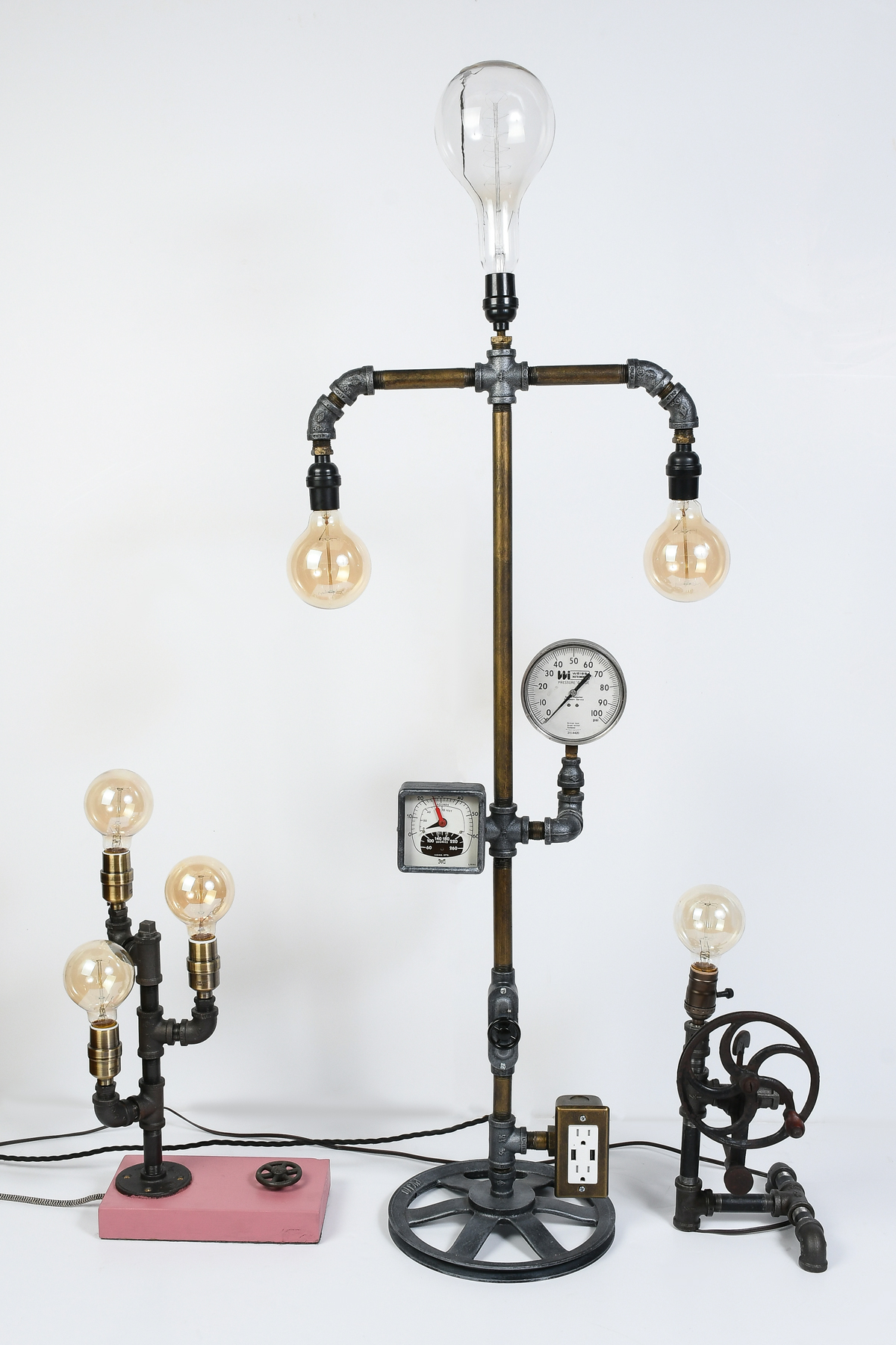 Appraisal: STEAMPUNK INDUSTRIAL LAMPS Steampunk artisan lamps of metal pipes pulleys