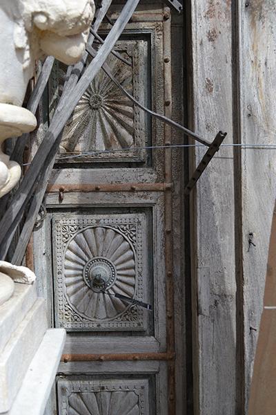 Appraisal: A PAIR OF INDIAN CARVED TEAK DOORS AND A SURROUND