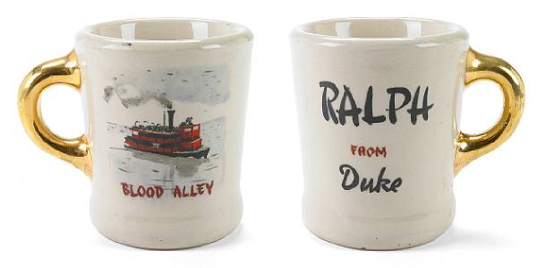 Appraisal: A John Wayne coffee mug from Blood Alley Warner Bros