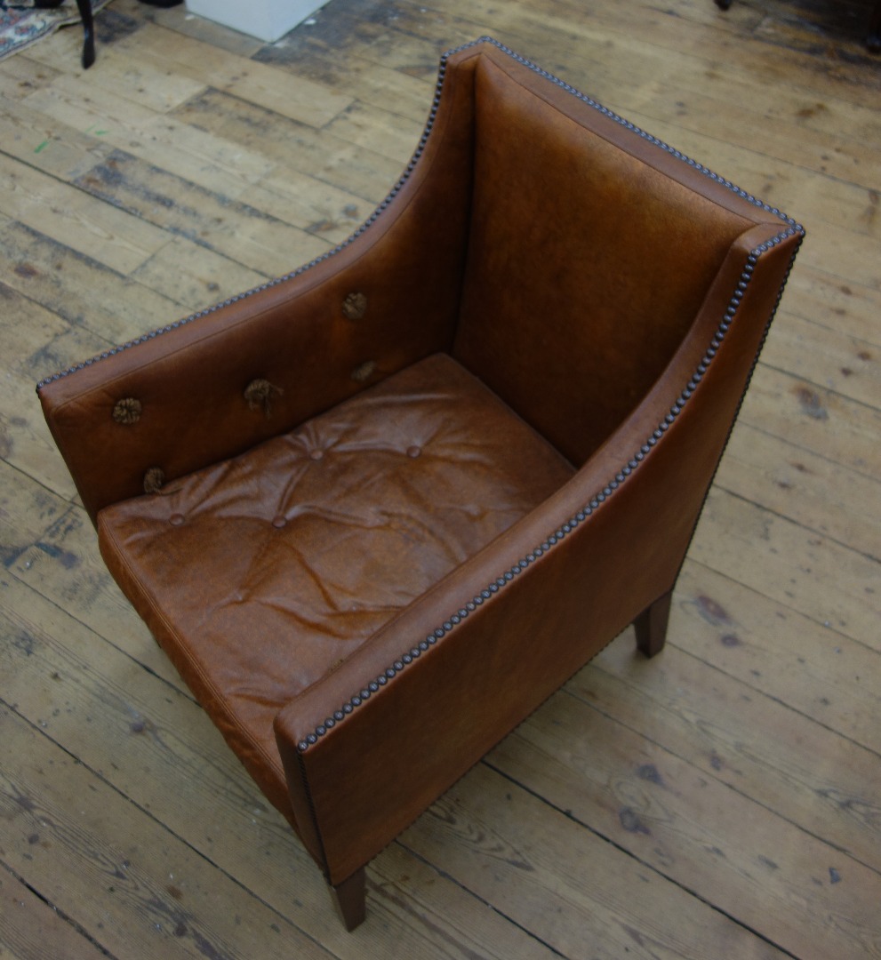 Appraisal: A reproduction 'Nelson' armchair by Linley upholstered in studded and