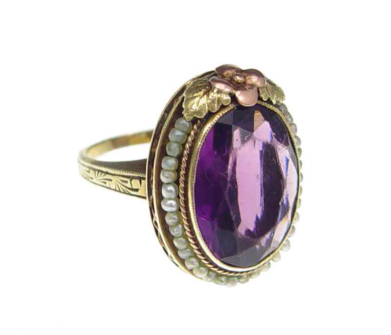 Appraisal: AMETHYST SEED PEARL RING K yellow gold ring contains one