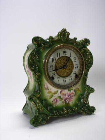 Appraisal: Gilbert porcelain mantle clock with floral decor