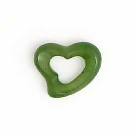 Appraisal: A carved jade heart shaped charm by Tiffany Co width