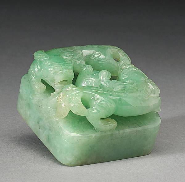 Appraisal: An apple green jadeite seal The semi-translucent crystaline matrix displaying