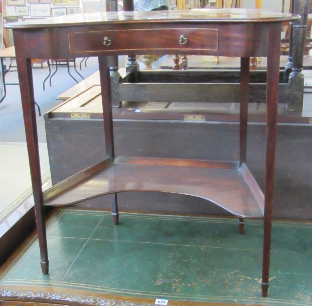 Appraisal: A George III writing table of unusual convex form with