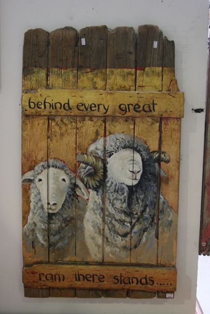 Appraisal: Annie Herron Ram and Ewe painted on a plank fence