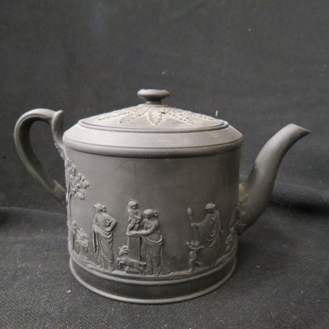 Appraisal: Wedgwood Balsalt Teapot raised classical ladies cherub in the garden