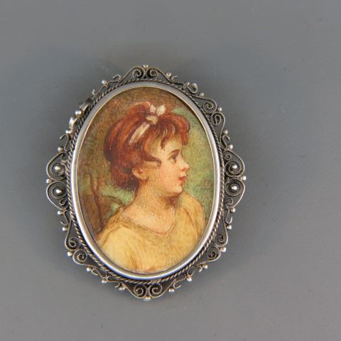 Appraisal: Miniature Painting on Ivory Brooch or Pendant young girl Italian