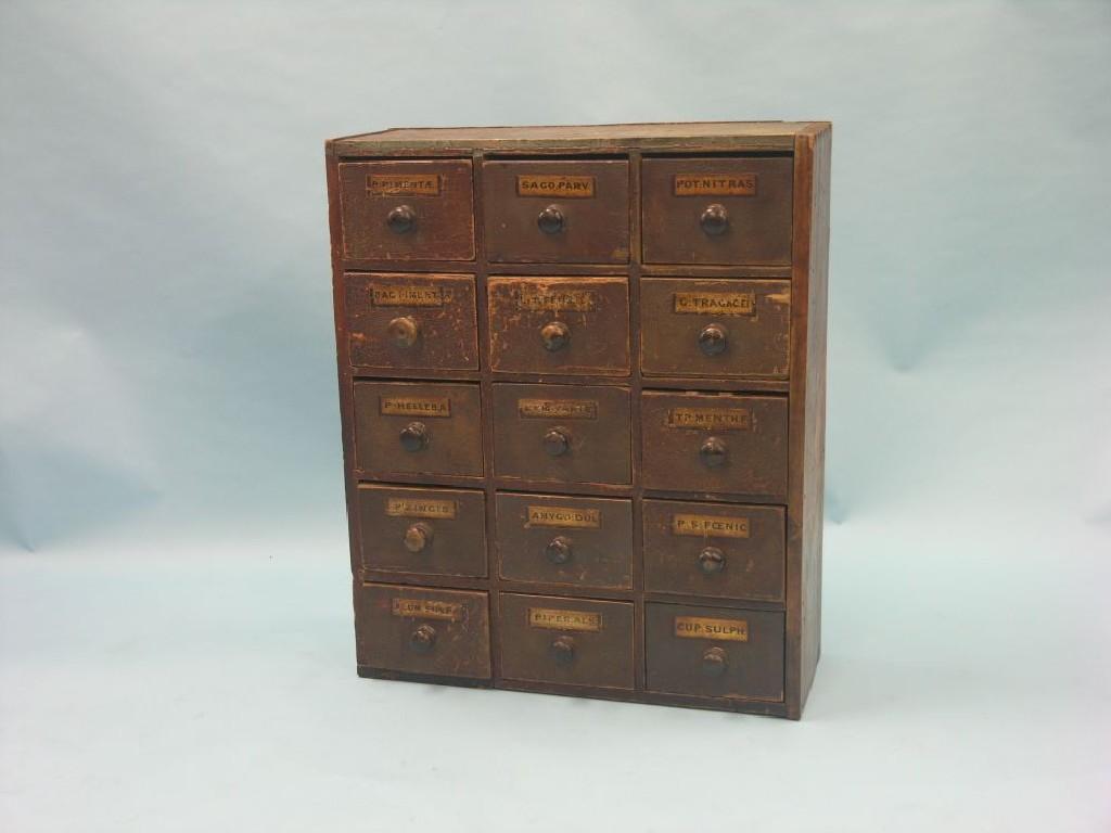 Appraisal: A mid th century apothecary's bank of drawers five rows