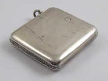 Appraisal: A patent two compartment silver vesta case with suspensory loop