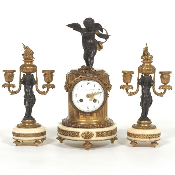 Appraisal: FRENCH EMPIRE THREE-PIECE D'ORE AND PATINATED BRONZE CLOCK GARNITURE CA