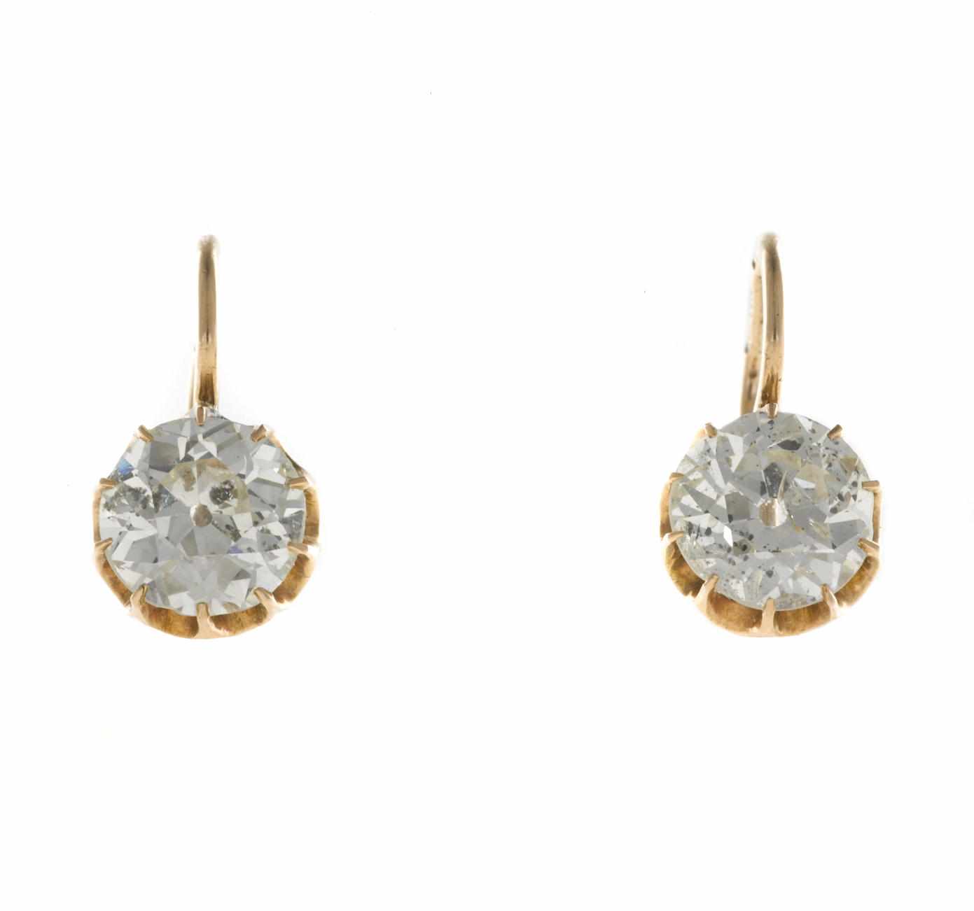 Appraisal: A pair of diamond solitaire earrings with partial Russian assay